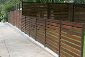 Horizontal wood fence with metal frame